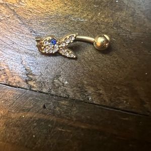 Playboy belly ring